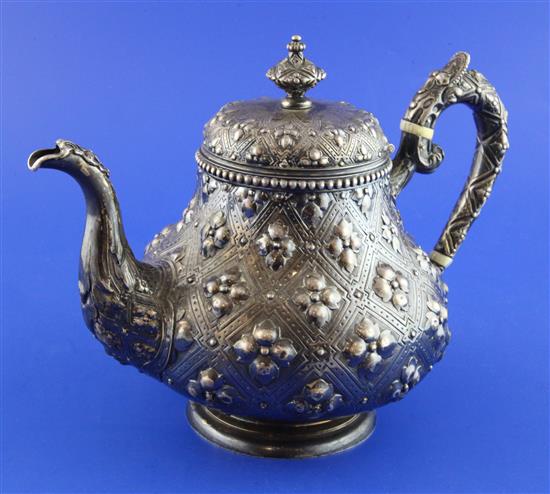 A Victorian silver teapot by Robert Hennell II, gross 24 oz.